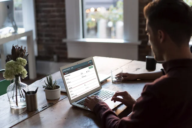 Working on a laptop at a desk